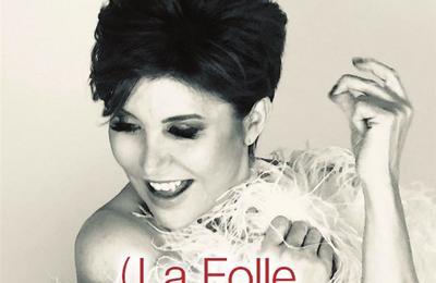 Liane Foly dans La folle repart en thèse à Lyon