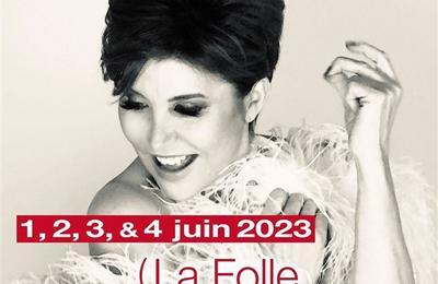Liane Foly dans La folle repart en thèse à Paris 2ème